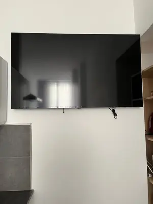 Télévision ou salle de divertissement dans l'établissement Joli T2 en plein centre-ville de Lyon