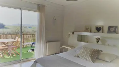Un ou plusieurs lits dans un hébergement de l'établissement La Maison de Boyeux