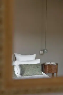 Un ou plusieurs lits dans un hébergement de l'établissement La Maison des Monts d'Or