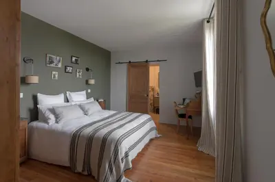 Un ou plusieurs lits dans un hébergement de l'établissement La Maison des Monts d'Or