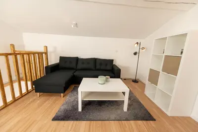 Coin salon dans l'établissement KASA DUPLEX - Climatisation - Balcon - Parking Privé