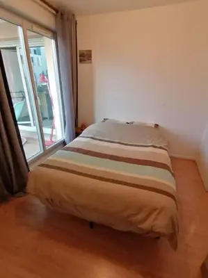 Un ou plusieurs lits dans un hébergement de l'établissement Appartement de charme, Garage, Terrasse, Piscine