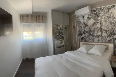 Un ou plusieurs lits dans un hébergement de l'établissement Villa Jacqueline