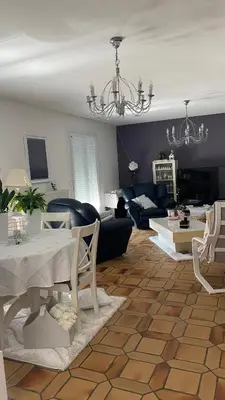 Coin salon dans l'établissement Chambres Quiétude