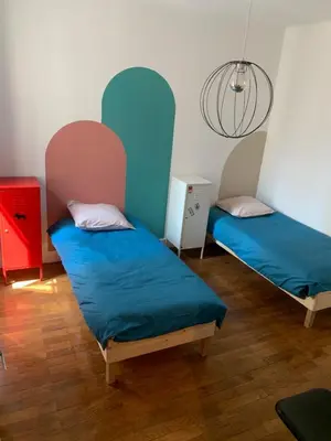 Un ou plusieurs lits dans un hébergement de l'établissement Appartement T3 Lyon, part Dieu