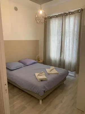 Un ou plusieurs lits dans un hébergement de l'établissement Appartement T3 Lyon, part Dieu