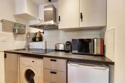 Cuisine ou kitchenette dans l'établissement Appartement cosy, confortable et idéalement situé