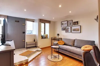Coin salon dans l'établissement Appartement cosy, confortable et idéalement situé