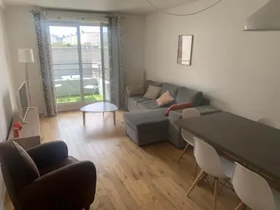 Coin salon dans l'établissement Appartement cosy