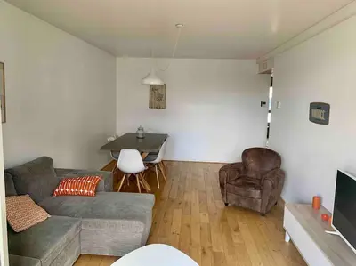 Coin salon dans l'établissement Appartement cosy