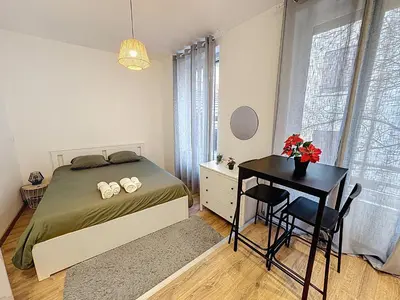 Un ou plusieurs lits dans un hébergement de l'établissement Appartement Cosy Saint-Chamond
