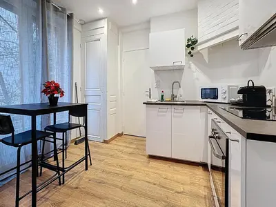 Cuisine ou kitchenette dans l'établissement Appartement Cosy Saint-Chamond