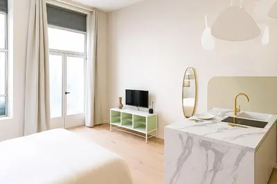 Télévision ou salle de divertissement dans l'établissement Le Kaolin