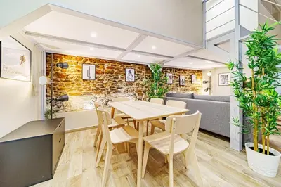 Coin salon dans l'établissement Le loft Montesquieu spacieux 6 pers Saxe Gambetta