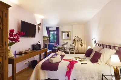 Un ou plusieurs lits dans un hébergement de l'établissement Le Clos Des Anges