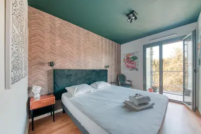 Un ou plusieurs lits dans un hébergement de l'établissement GuestReady - Apt près du Parc de la Tête d'Or