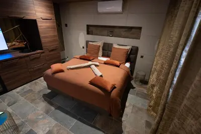 Un ou plusieurs lits dans un hébergement de l'établissement CARACALLA PRIVE - Chambres d'hôtes avec Piscine, Jaccuzi et Hammam privatifs