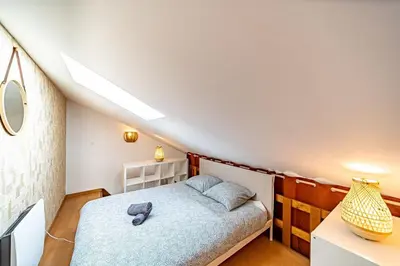 Un ou plusieurs lits dans un hébergement de l'établissement Apartment with Mezzanine Cusset District Villeurbanne