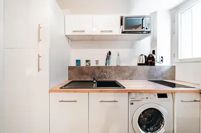 Cuisine ou kitchenette dans l'établissement Le petit Colbert-Studio cosy-Croix Rousse