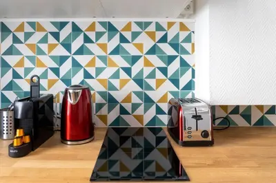 Cuisine ou kitchenette dans l'établissement Le Charpennes - Appartement pour 4 personnes proche du métro