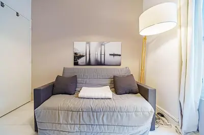 Un ou plusieurs lits dans un hébergement de l'établissement Le petit Delore - Studio 2 personnes - Lyon 8
