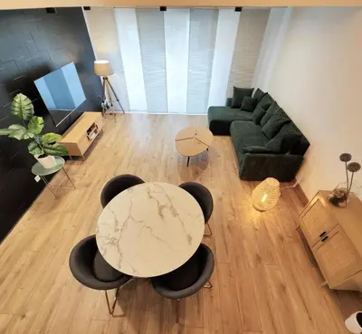 Coin salon dans l'établissement Superbe Cosy Duplex Appartement T3 Charpenne Tête D'or avec parking privé gratuit