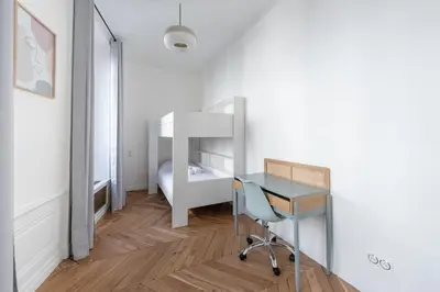 Un ou plusieurs lits dans un hébergement de l'établissement Le Merveilleux - Appt 111m2 au coeur de Lyon