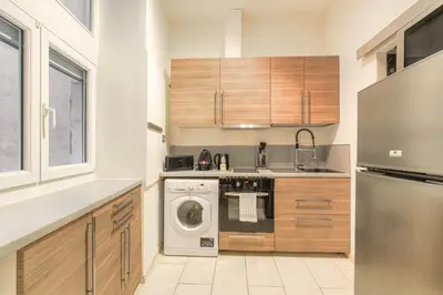 Cuisine ou kitchenette dans l'établissement Duplex de caractère en hypercentre