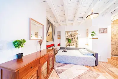 Coin salon dans l'établissement Le Petit St Paul Charming Studio T1 Bis in the heart of Old Lyon
