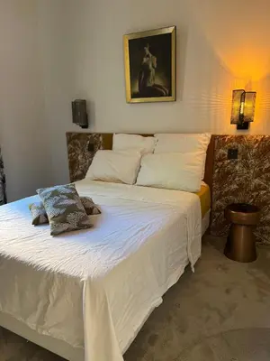 Un ou plusieurs lits dans un hébergement de l'établissement Appartement chic et de caractère !
