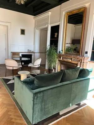 Coin salon dans l'établissement Appartement chic et de caractère !