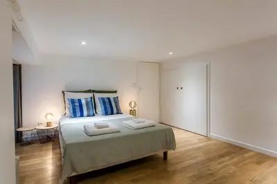 Un ou plusieurs lits dans un hébergement de l'établissement Charlie - Furnished apartment 260m² Downtown Lyon