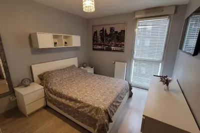 Un ou plusieurs lits dans un hébergement de l'établissement Appartement Voie Lactée Lyon