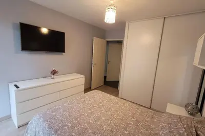 Un ou plusieurs lits dans un hébergement de l'établissement Appartement Voie Lactée Lyon