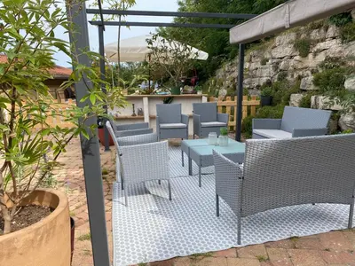 Coin salon dans l'établissement Maison sur cour et véranda