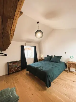 Un ou plusieurs lits dans un hébergement de l'établissement Bulles en Beaujolais Spa & Sauna