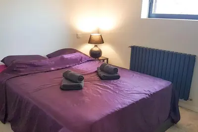 Un ou plusieurs lits dans un hébergement de l'établissement Le Petit Castel, Portes de Lyon