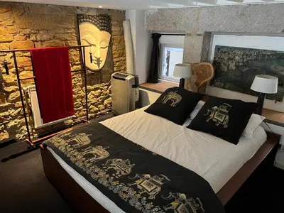 Un ou plusieurs lits dans un hébergement de l'établissement Loft sur saône