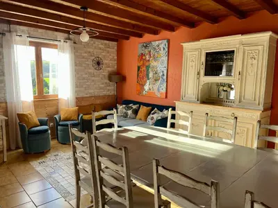 Coin salon dans l'établissement Gîte LES GOUTTES