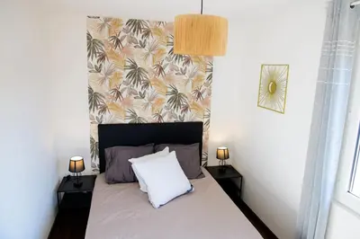 Un ou plusieurs lits dans un hébergement de l'établissement Le Forez Appartement 4 pers ou Studio 2 pers