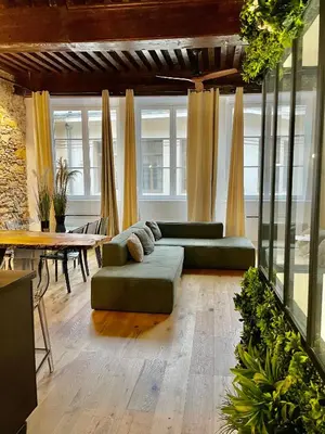 Coin salon dans l'établissement Les Balcons de Guignol