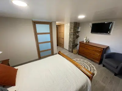Télévision ou salle de divertissement dans l'établissement Le Relais de Choz