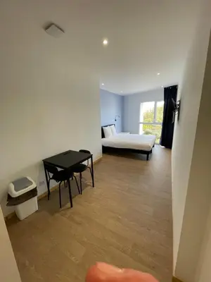 Coin salon dans l'établissement LE SALVADOR - Appart'Hôtel de 18m2 à 44m2