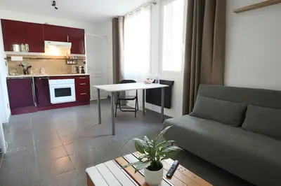 Cuisine ou kitchenette dans l'établissement Appartement Les Trois Renards-Tassin