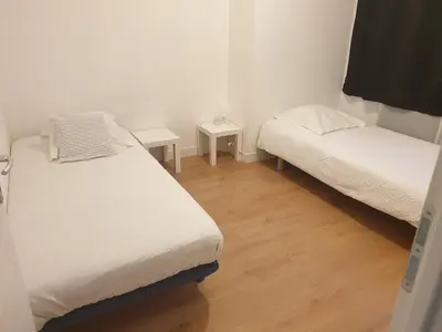 Un ou plusieurs lits dans un hébergement de l'établissement MAISON C