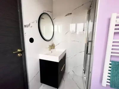 Salle de bains dans l'établissement LE PUNTA CANA