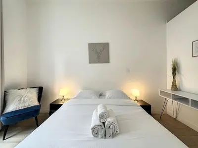 Un ou plusieurs lits dans un hébergement de l'établissement Cosy appart - lyon 6 - Gare Partdieu - Lafayette 1