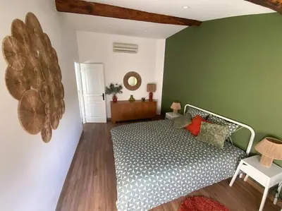 Un ou plusieurs lits dans un hébergement de l'établissement Petite maison de village