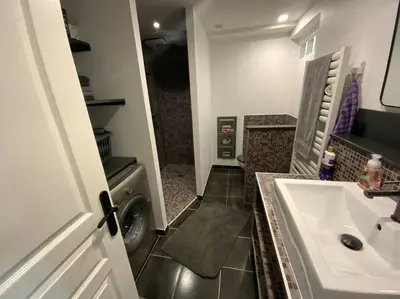 Cuisine ou kitchenette dans l'établissement Petite maison de village