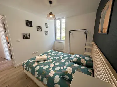 Un ou plusieurs lits dans un hébergement de l'établissement Appartement JAZZ Vienne nord